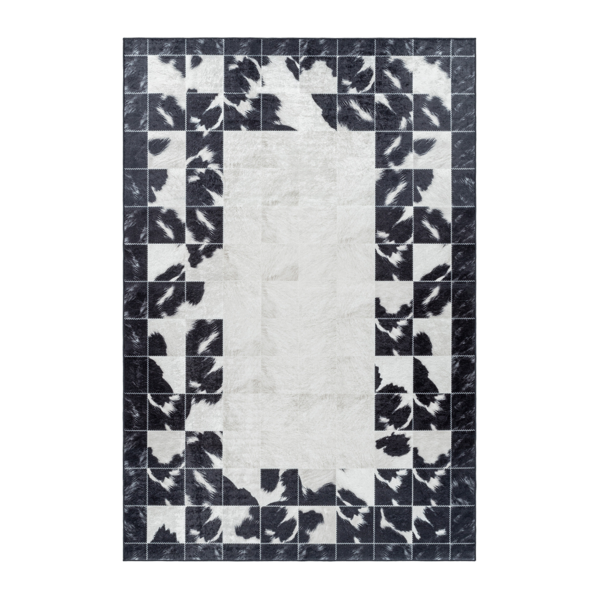 FIESTA - Tapis patchwork imitation peau noir et blanc