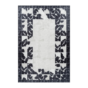FIESTA - Tapis patchwork imitation peau noir et blanc