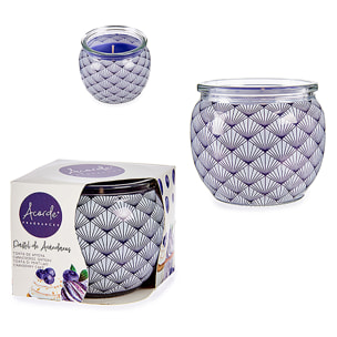 Vela perfumada en tarro de cristal olor a tarta de arándanos.