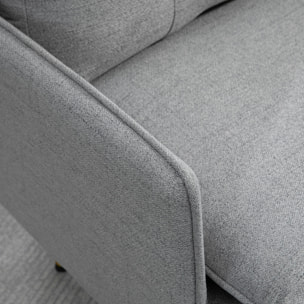 Fauteuil style art-déco dossier effet capitonné piètement incliné effilé métal noir extrémités dorées tissu gris