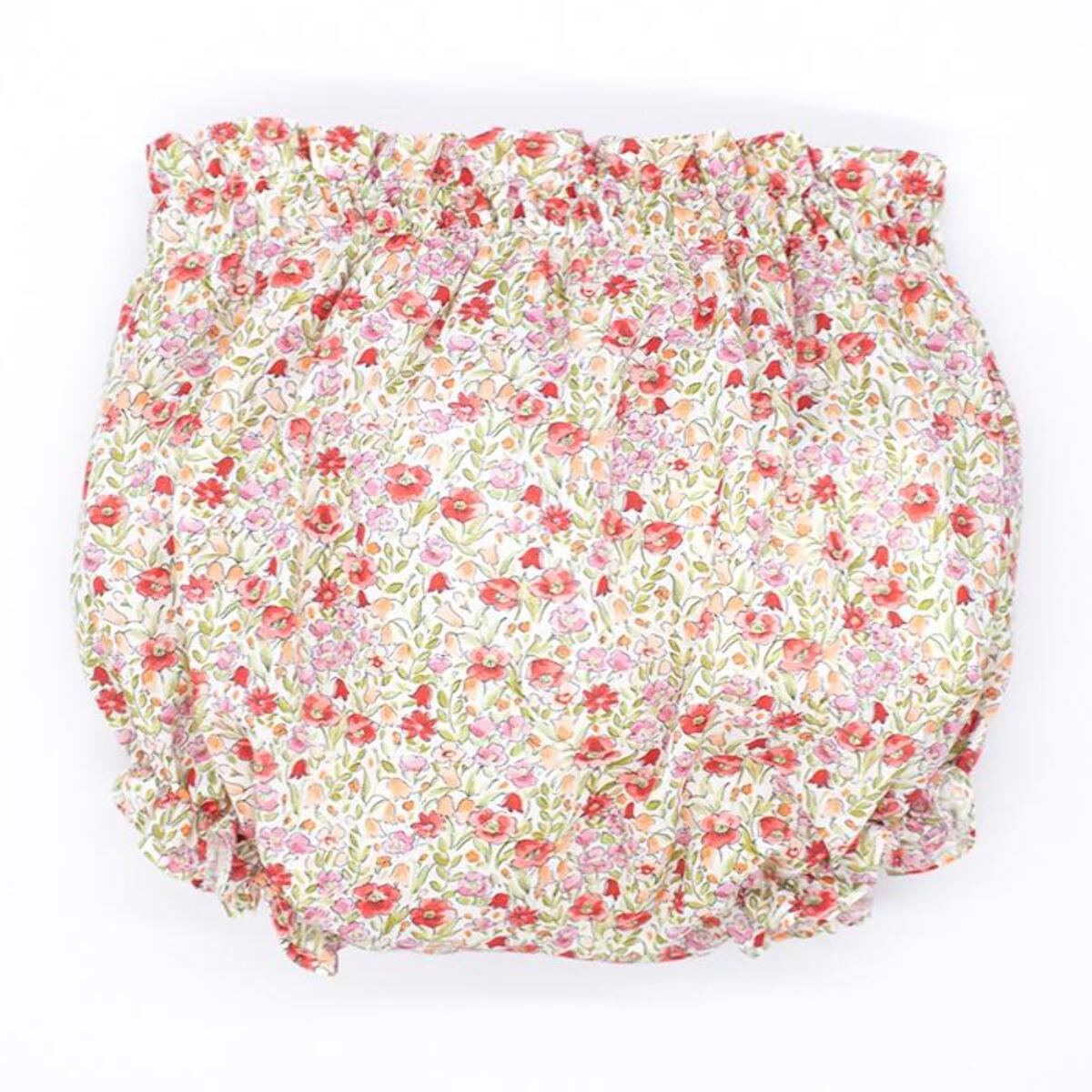 Ranita de flores rojas, goma en cintura y en las piernas.