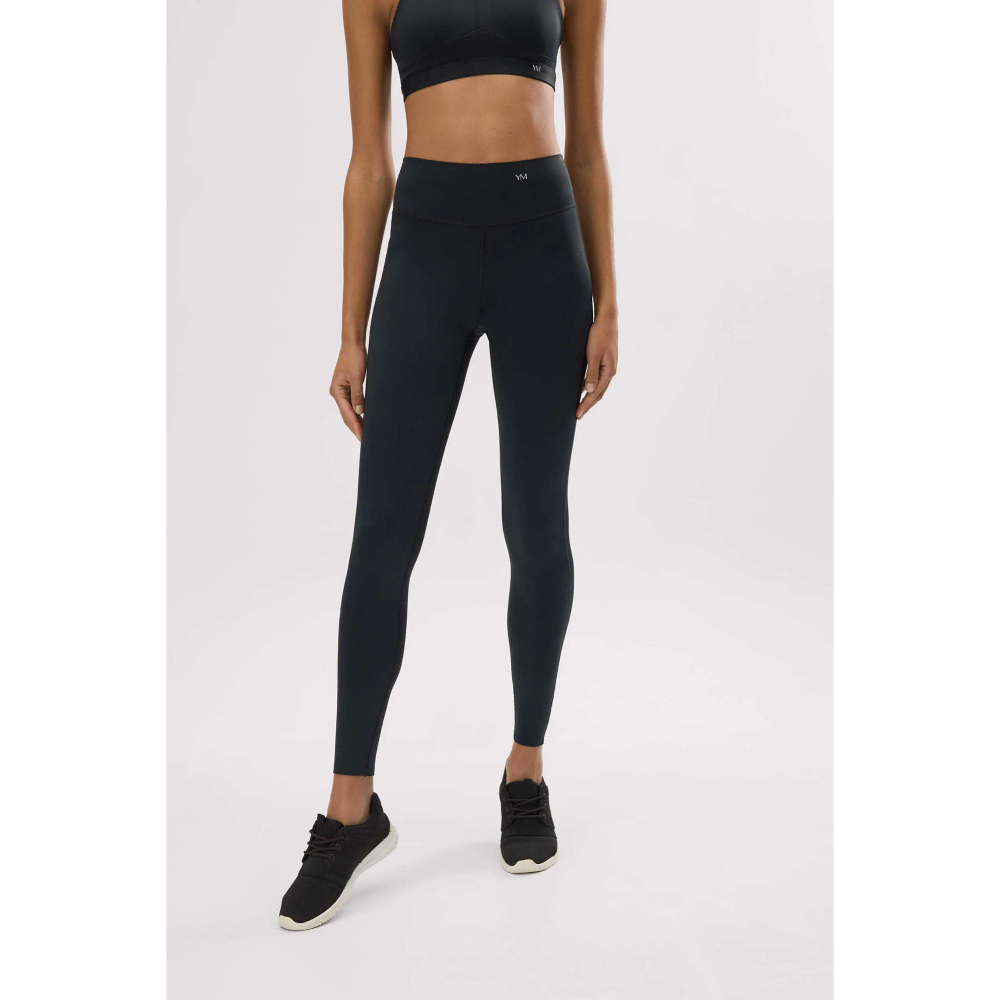 Leggings sportivi neri effetto pancia piatta