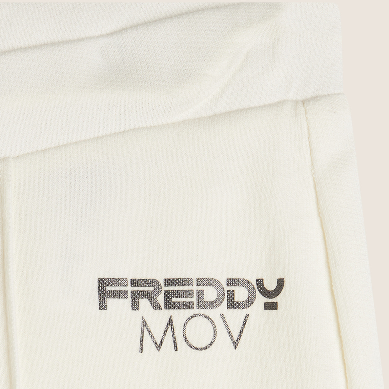 Pantaloni Slim Fit in French Terry con fondo Flare