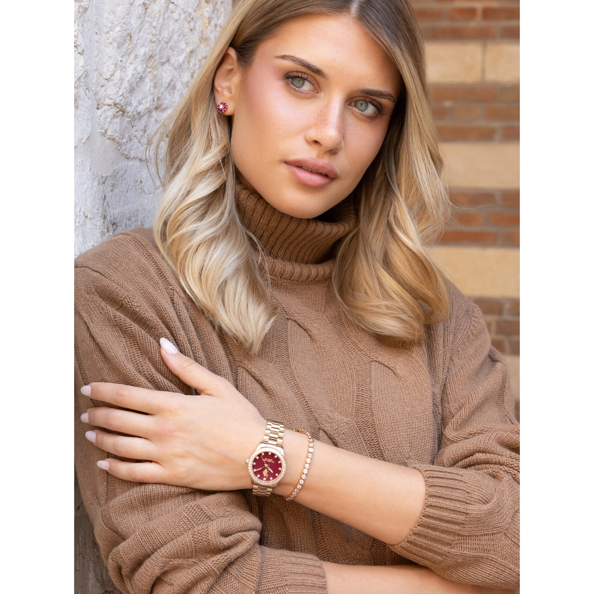 Bracciale U.S. Polo Assn. In metallo dorato rosa con cristalli bianchi rotondi