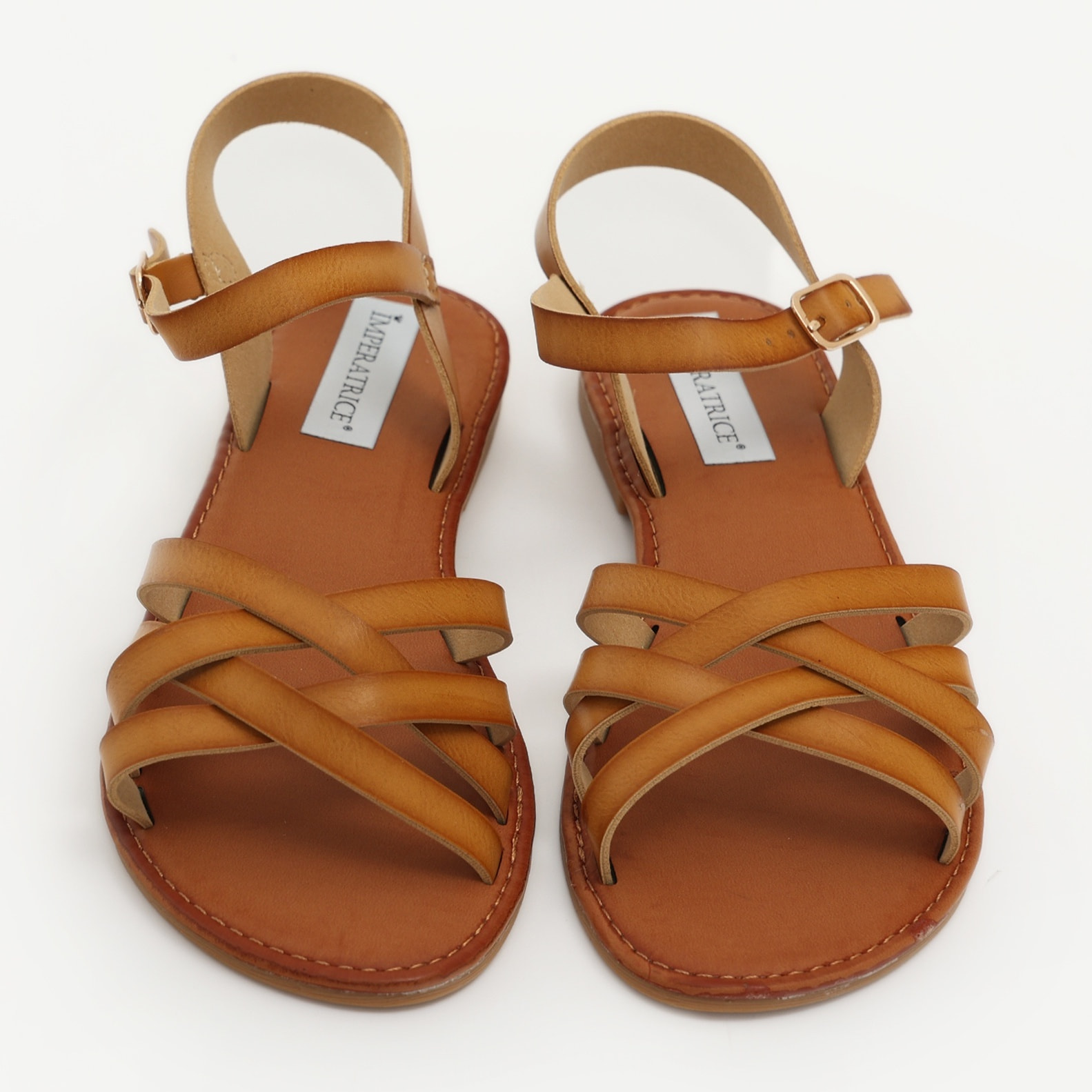 Sandali bassi in simil pelle con fasce incrociate