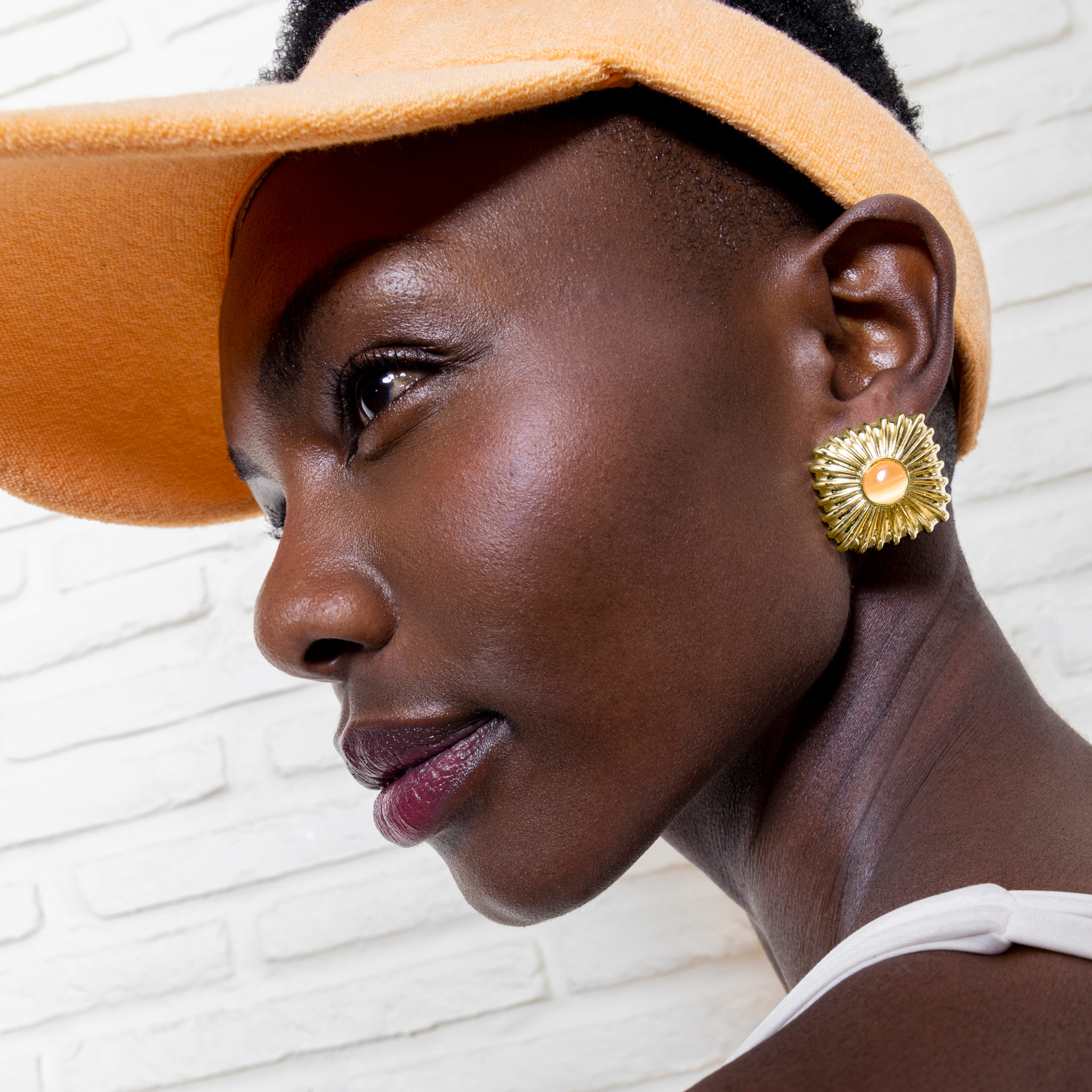 Pendientes de Ojo de Gato Naranja acabados en oro amarillo de 18k
