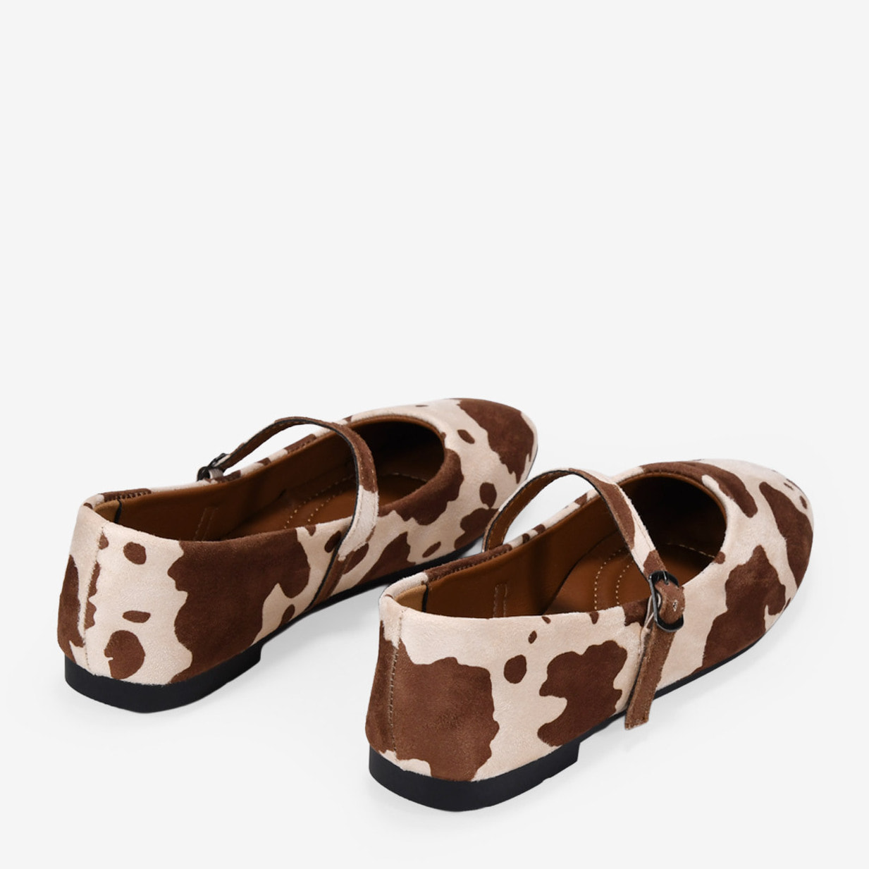 Bailarinas planas con estampado de vaca