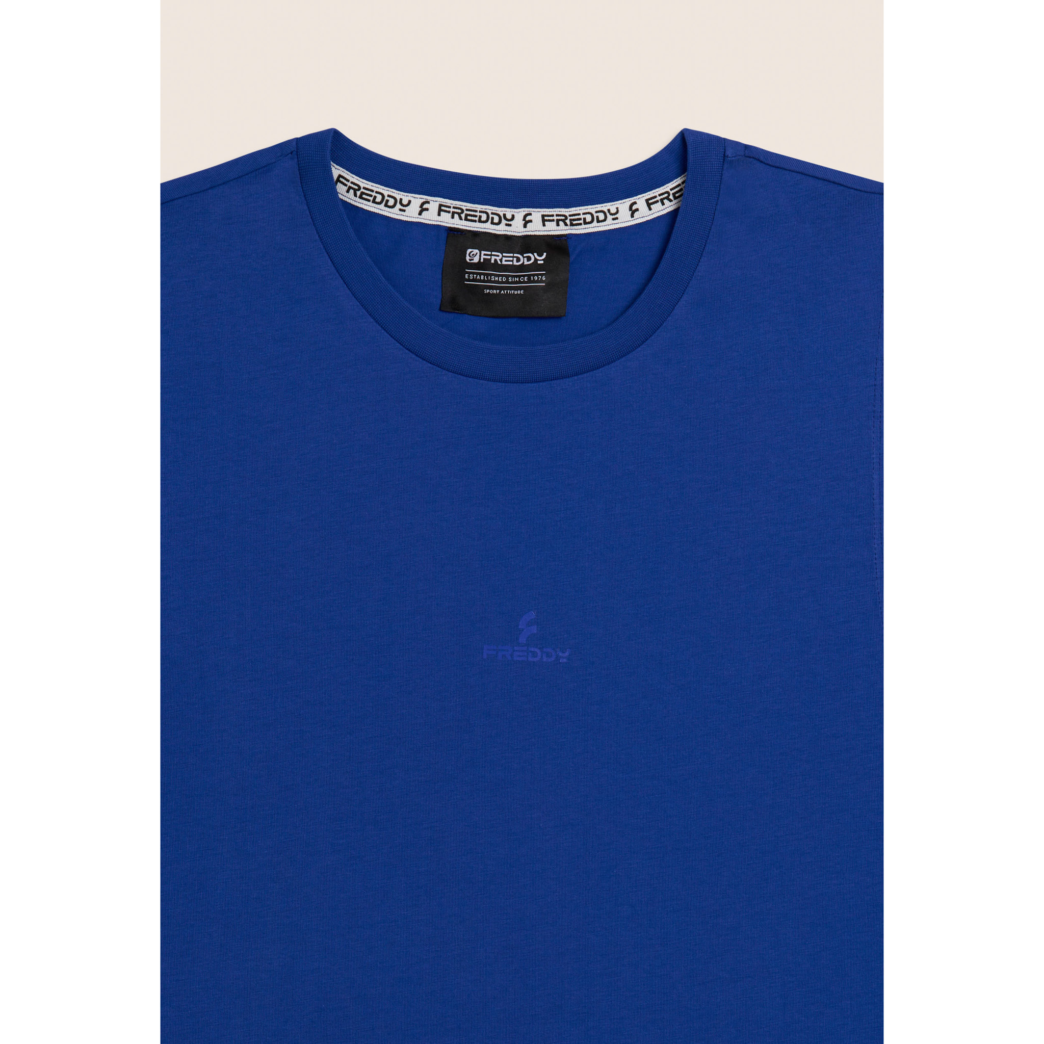 Completo sportivo in cotone con top smanicato e bermuda