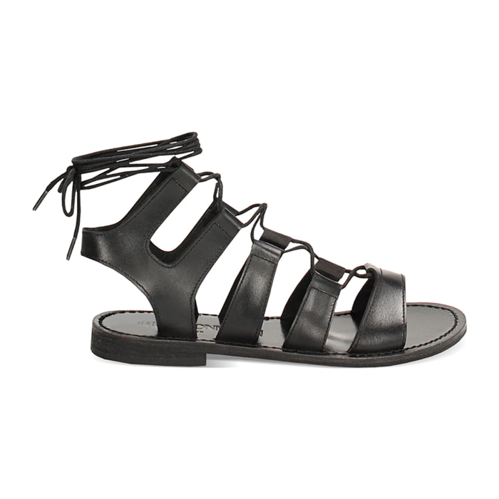 Sandalias planas negras de piel vacuna