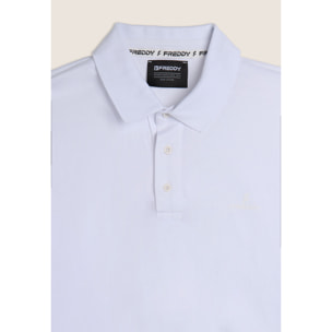 Polo manica lunga con spacchi laterali