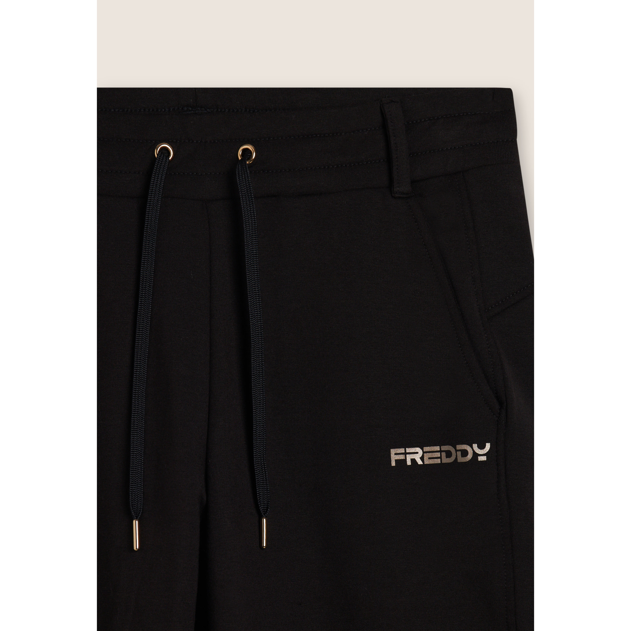 Pantaloni slim fit con spacchi laterali