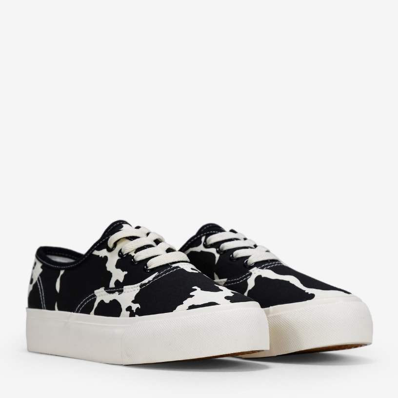 Zapatillas de tela con estampado vaca y plataforma