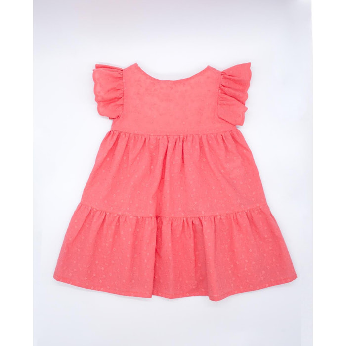 Vestido de voile bordado coral. Con volantes en las sisas, falda fruncida de volantes.