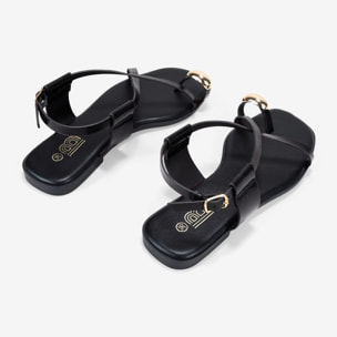 Sandalias planas negras de dedo con anillo