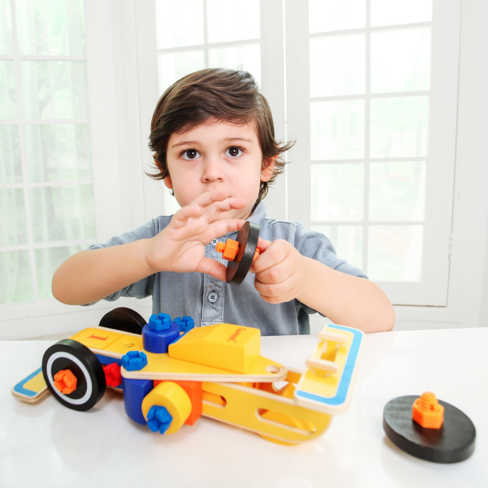 COCHE DE CARRERAS F1 DE CONSTRUCCIÓN (TRANSFORMABLE)