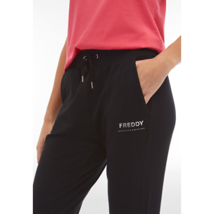 Pantaloni sportivi in jersey con tasche e fondo a polsino