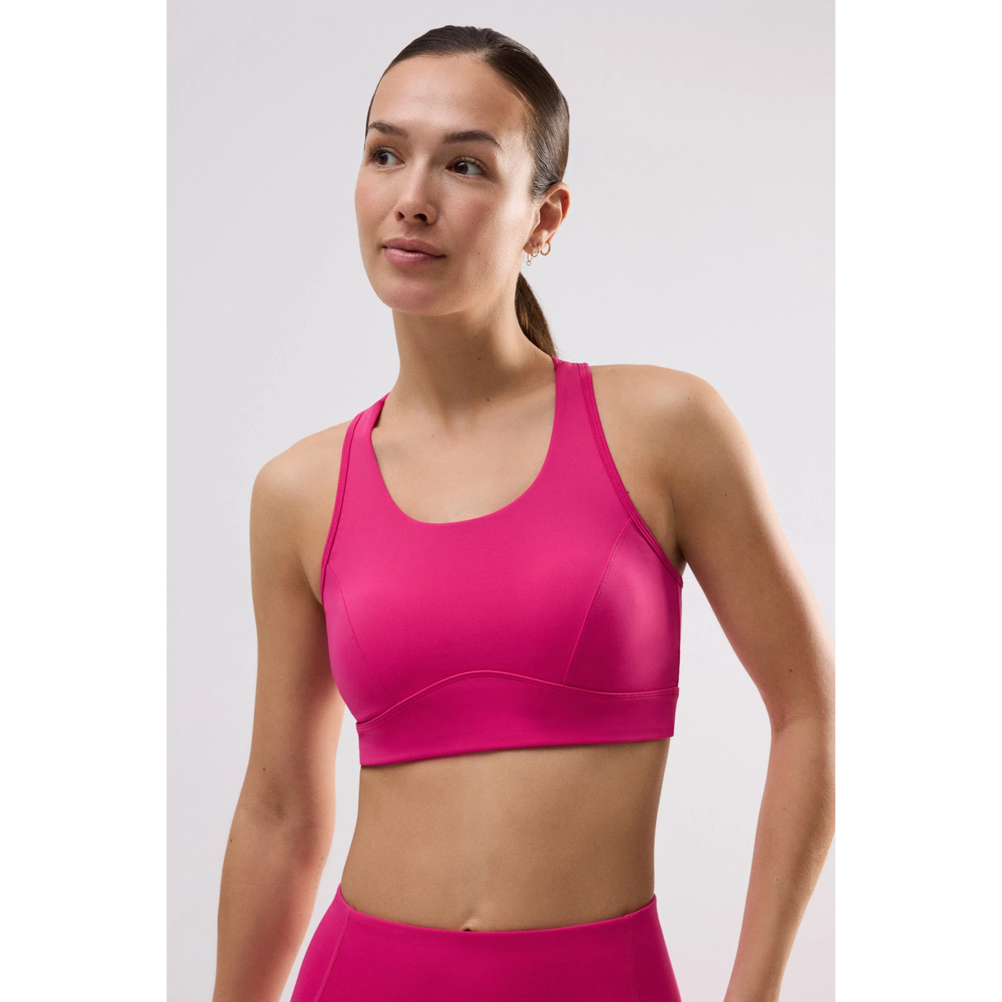 Reggiseno sportivo a sostegno medio con imbottitura rimovibile in fucsia