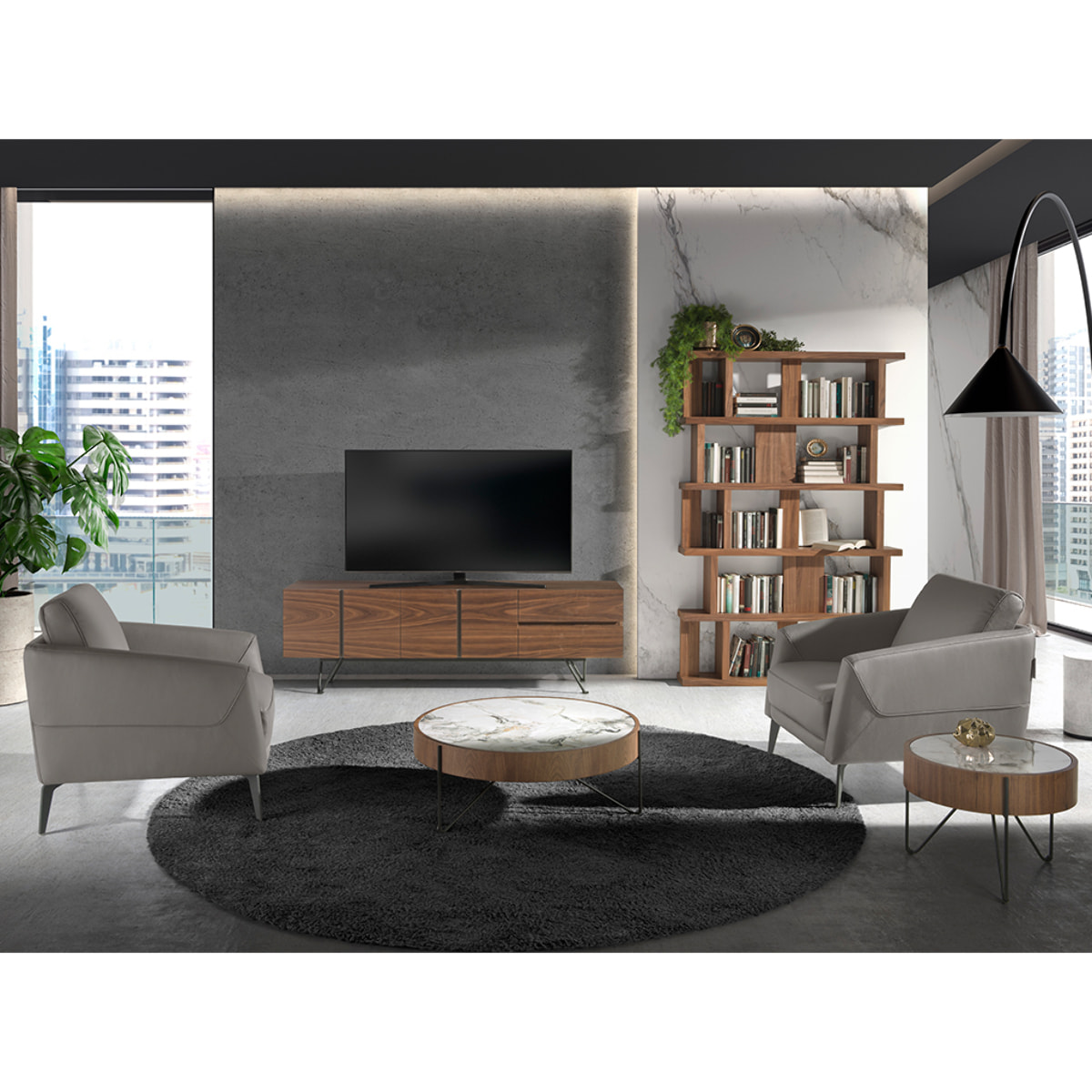 Sillón Angel Cerdá con reposabrazos con asiento y respaldo tapizados en piel de origen vacuno en gris oscuro patas de acero inoxidable en epoxi negro 78x80x82cm