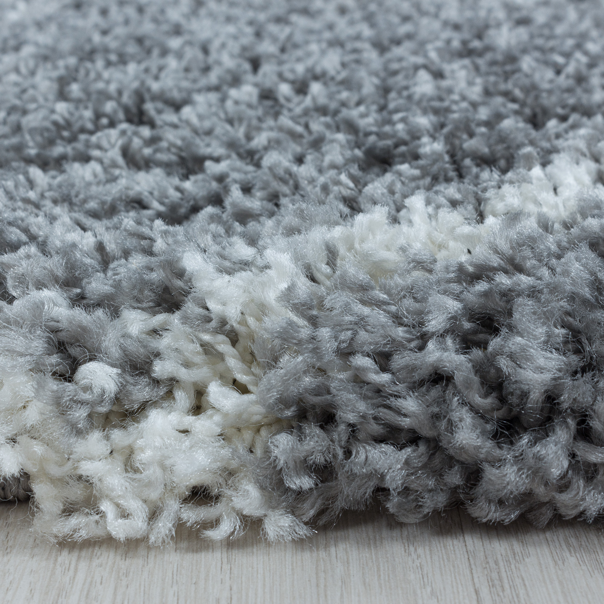 ALVOR - Tapis shaggy rond à poils longs motif berbère gris