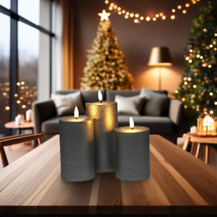 set de 3 velas led en color plata de superficie rústica