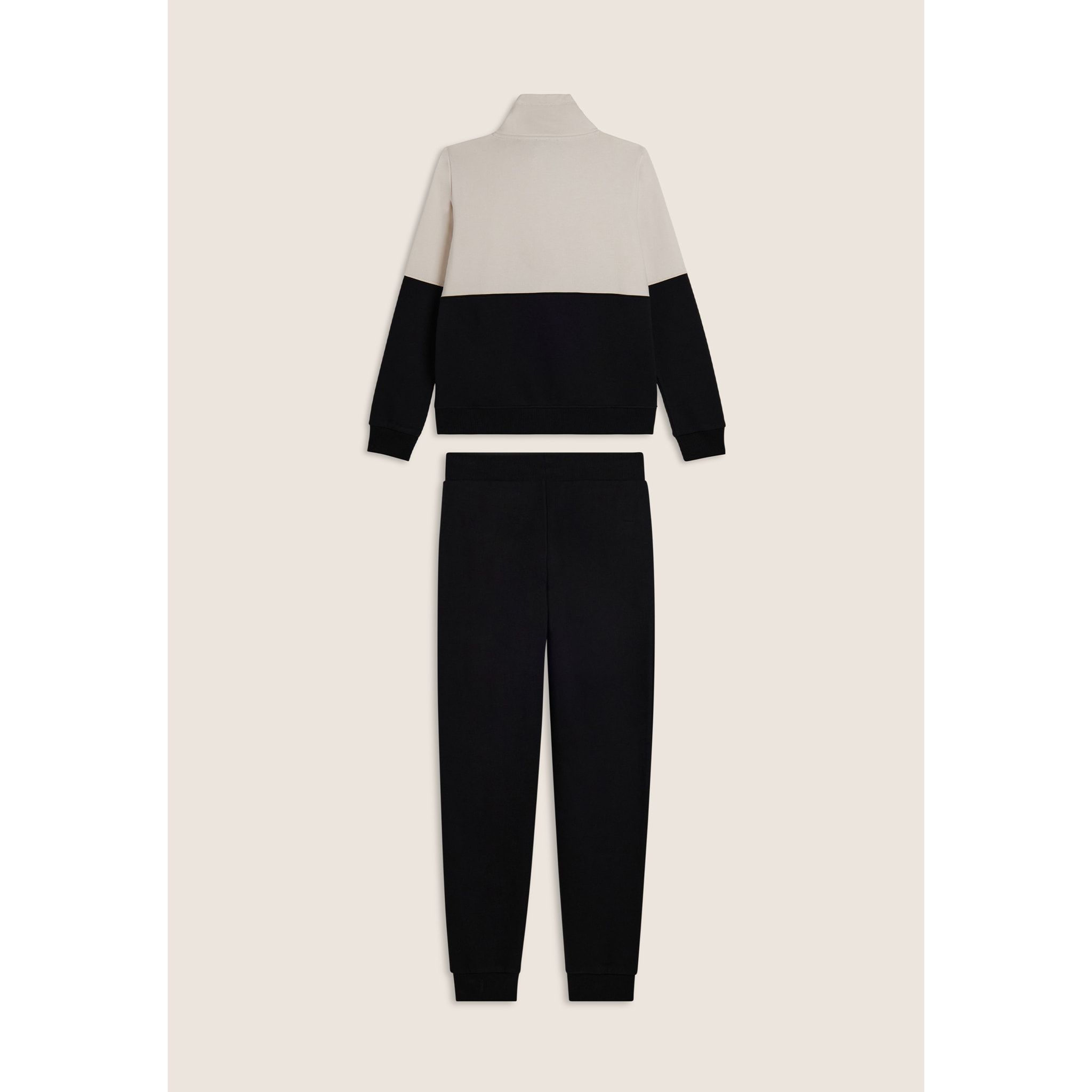 Tuta con zip e collo alto decorata da inserti animalier