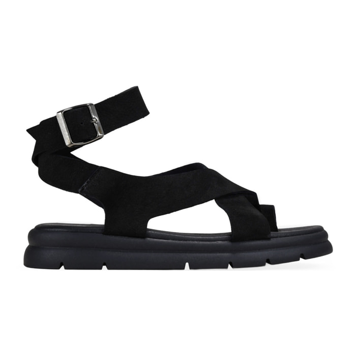 Sandalias de dedo negras en piel con hebilla