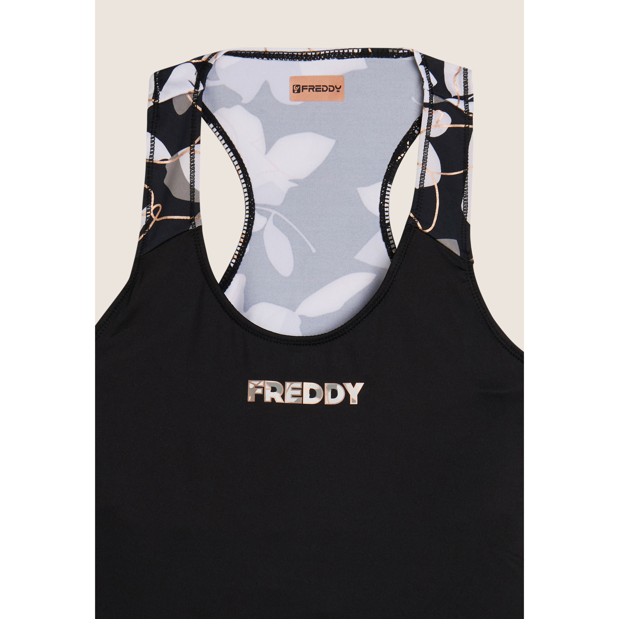 Canotta sportiva in tessuto tecnico con inserto floreale