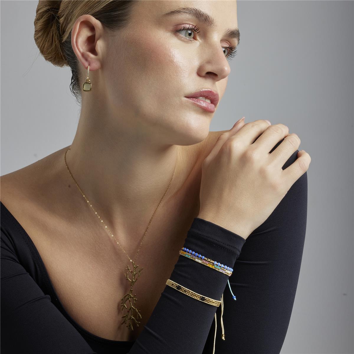 Pulsera con Cristal Azul acabado oro 18k