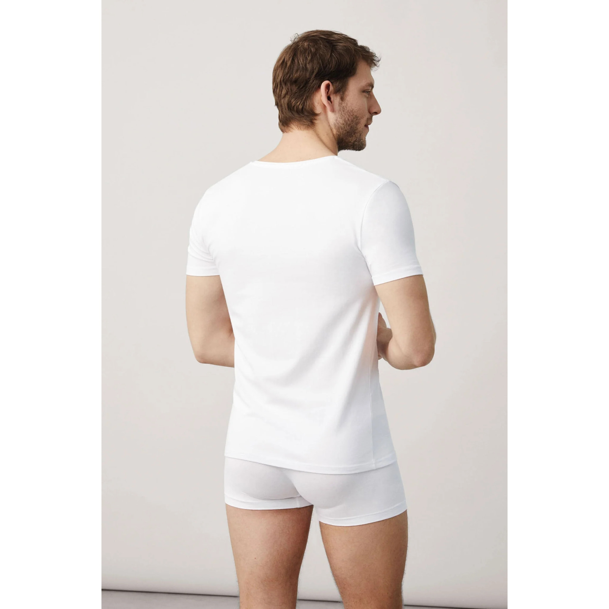 Maglietta bianca in cotone a maniche corte con scollo a V