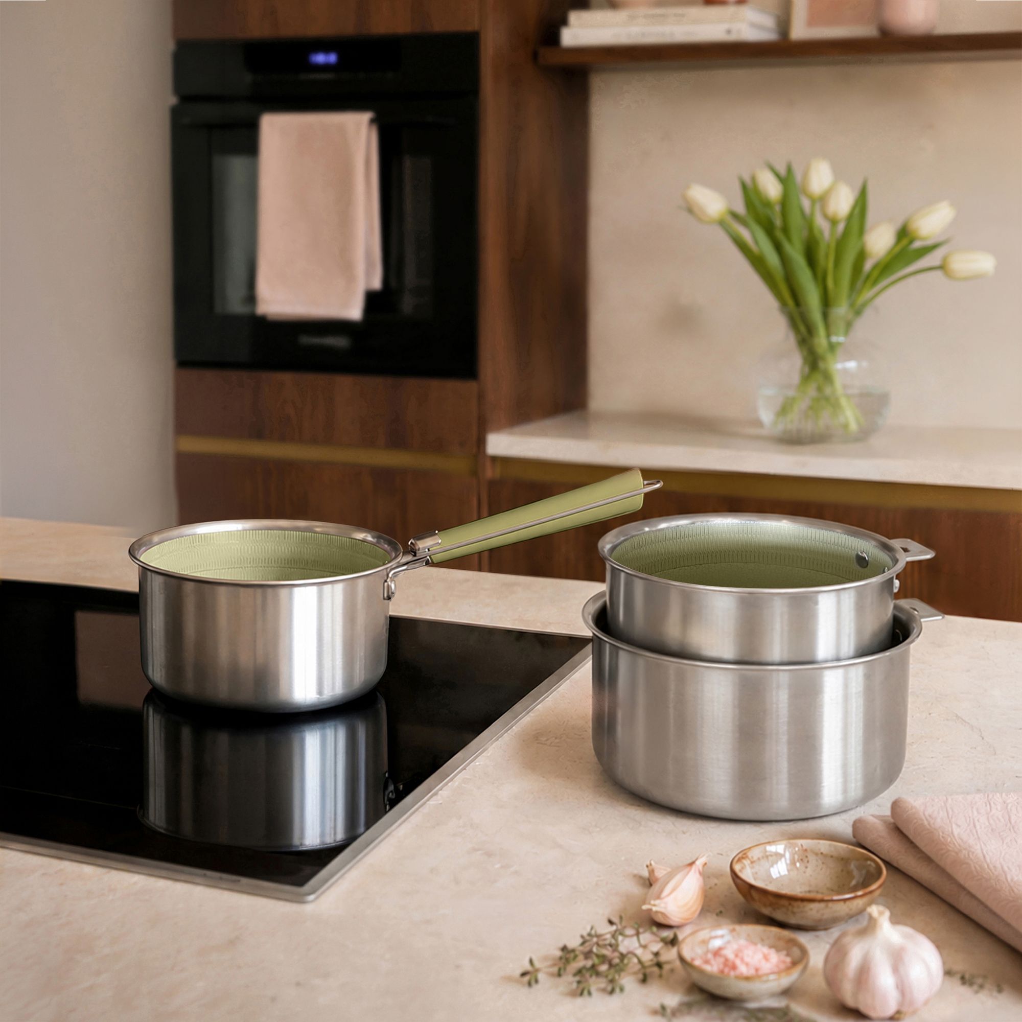 Set de 3 casseroles en acier inoxydable et une poignée amovible vert AGLAE