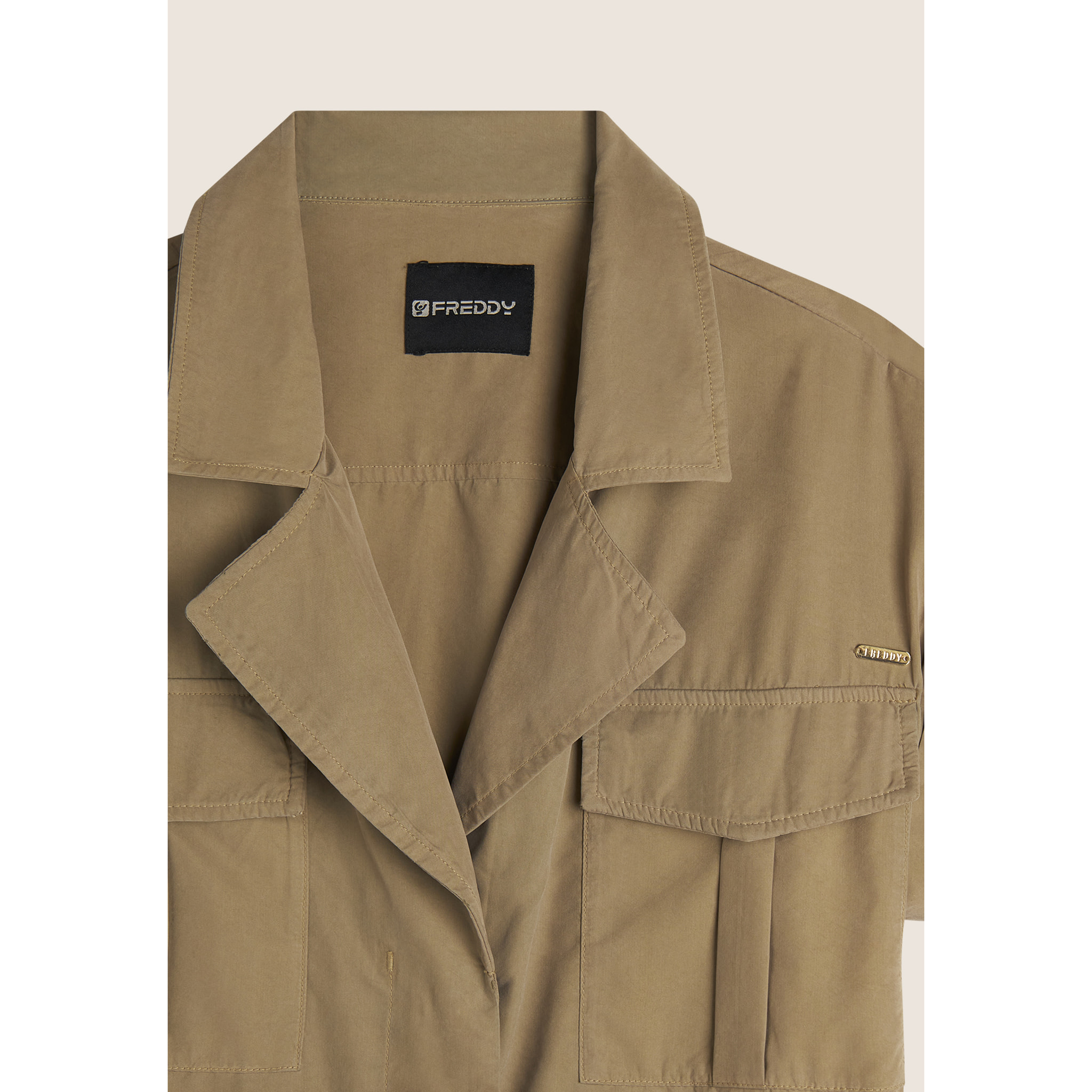 Trench donna senza maniche con cintura in vita