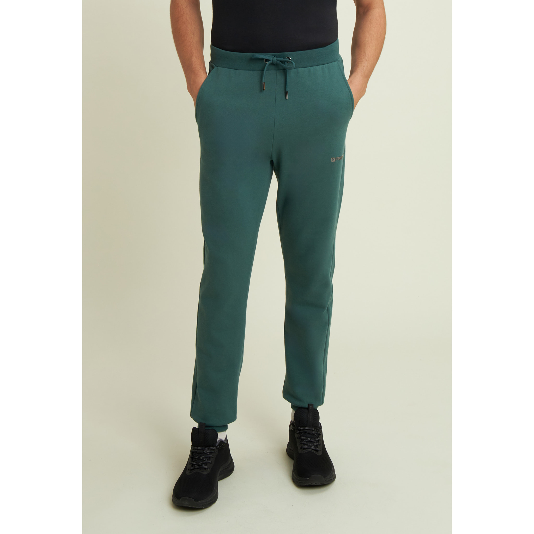 Pantaloni regular in felpa garzata con fondo in costina