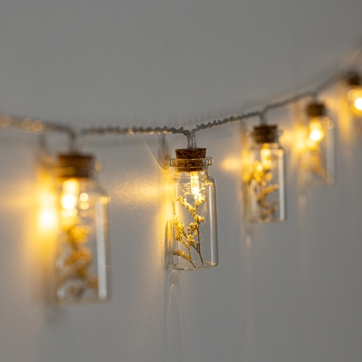 Guirlande LED à pile - 10 fleurs - verre - L165 cm