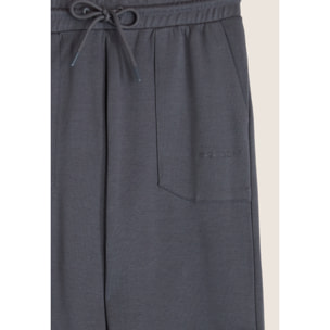 Pantaloni slim in interlock con stampa UT e cuciture