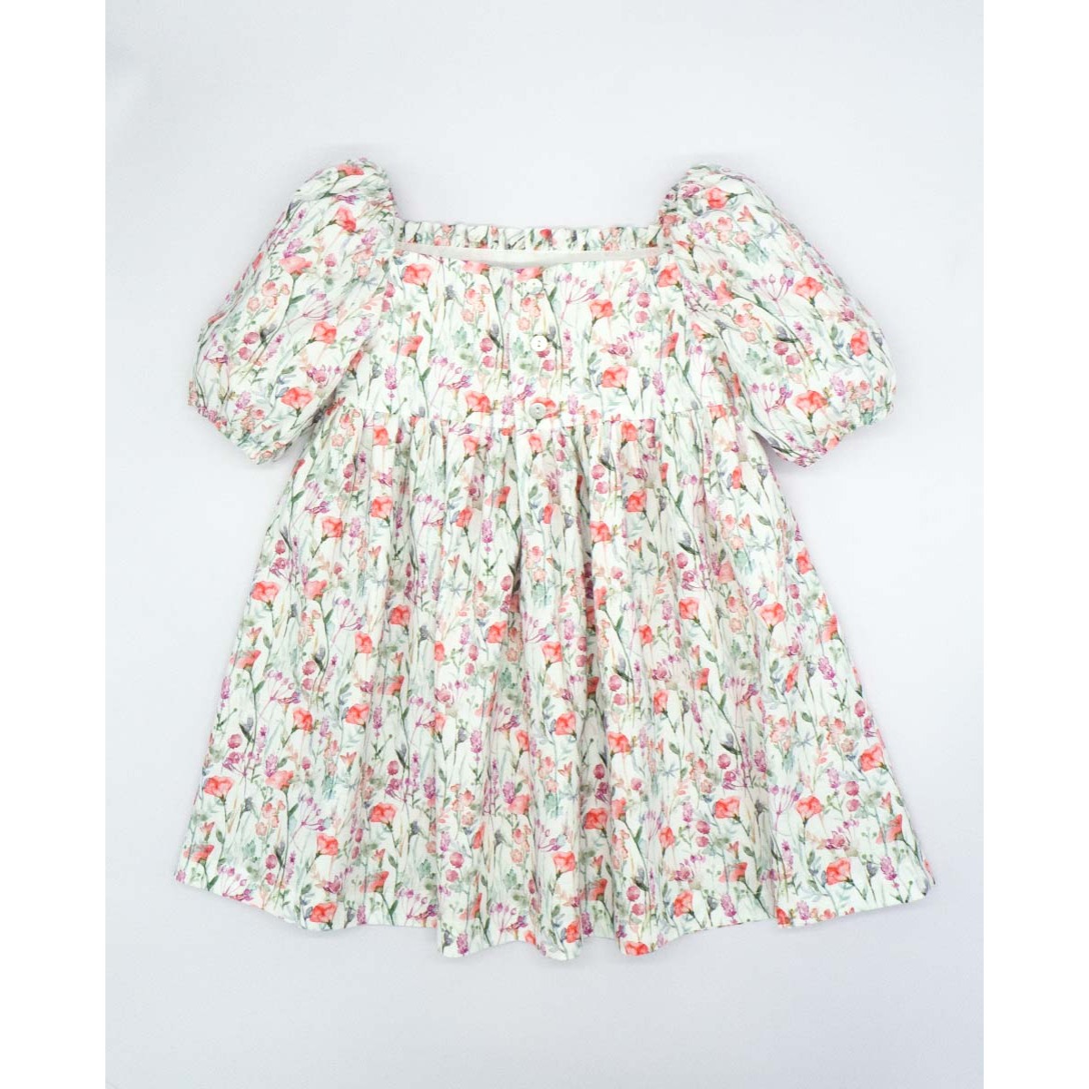 VESTIDO MANGA ABULLONADA FLOR ROSA