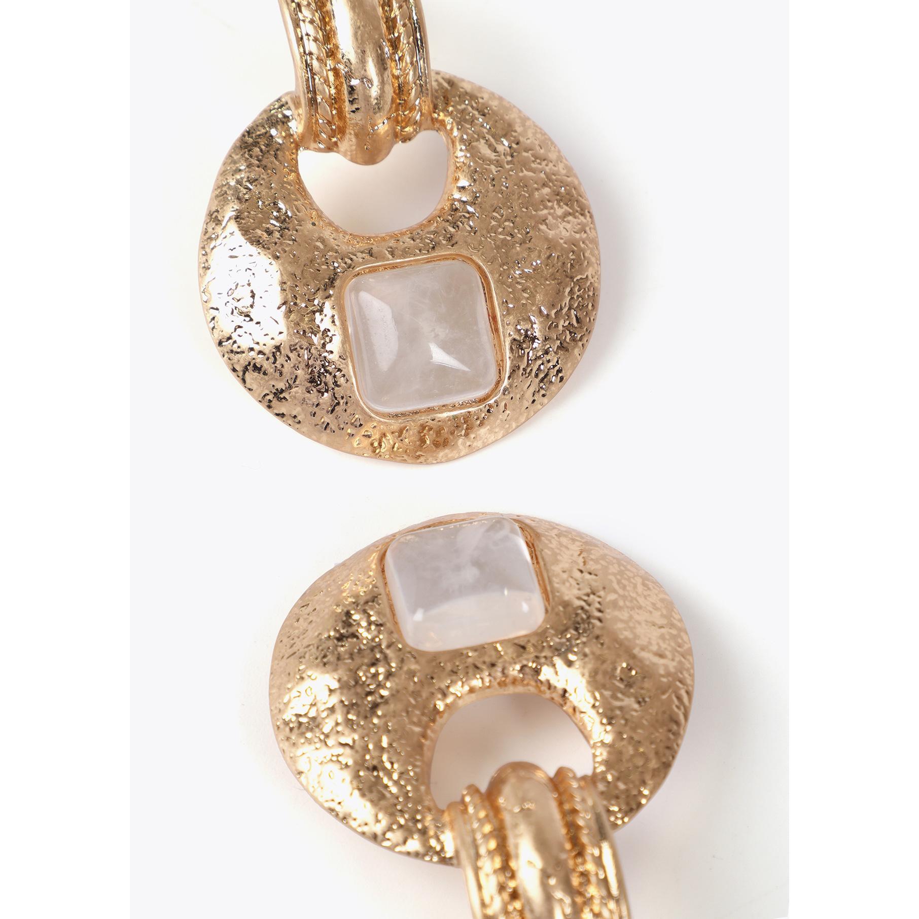 Orecchini incastonati in metallo martellato