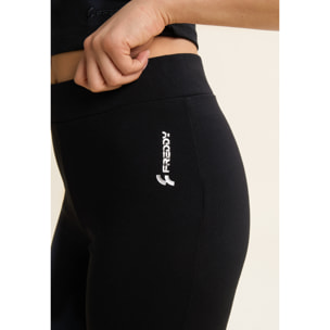 Pantaloni slim fit neri in french terry con fondo a zampa