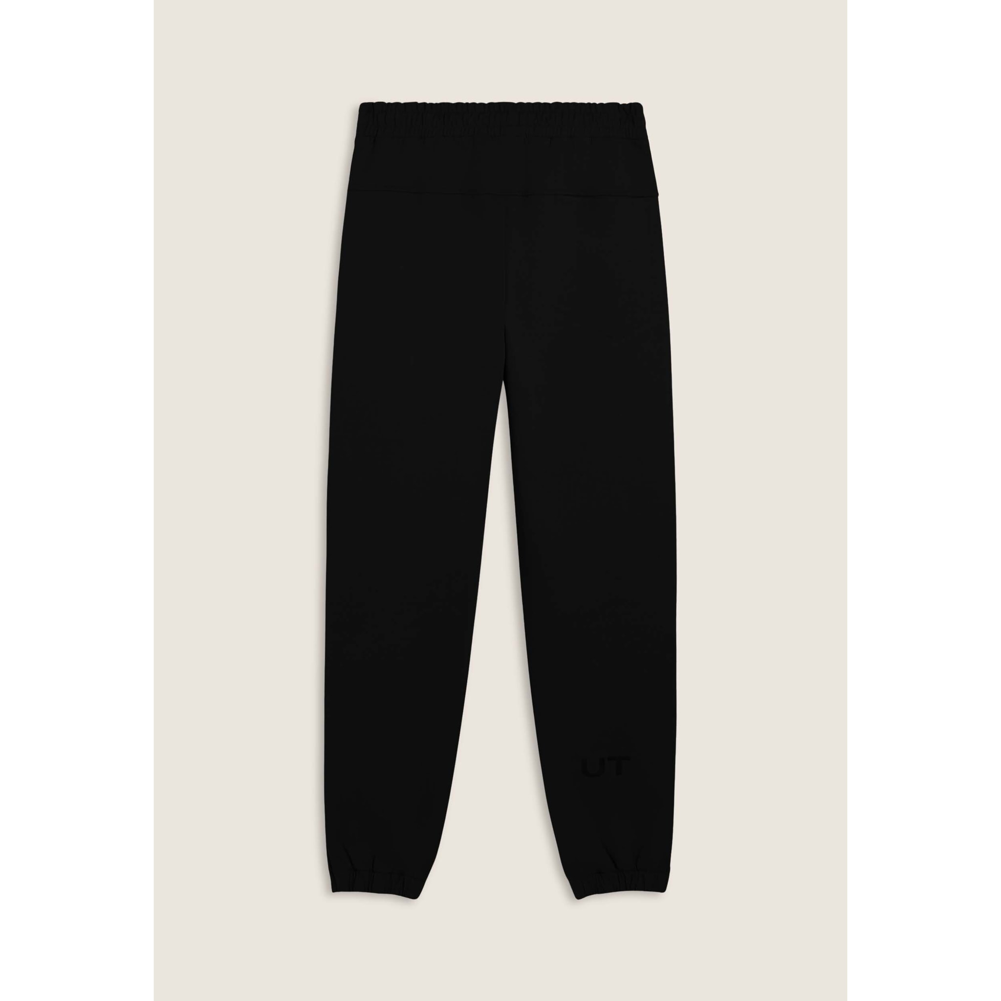 Pantaloni slim in interlock con dettagli lucidi