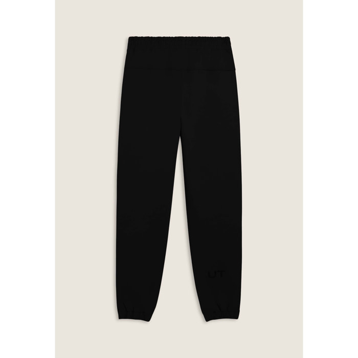 Pantaloni slim in interlock con dettagli lucidi