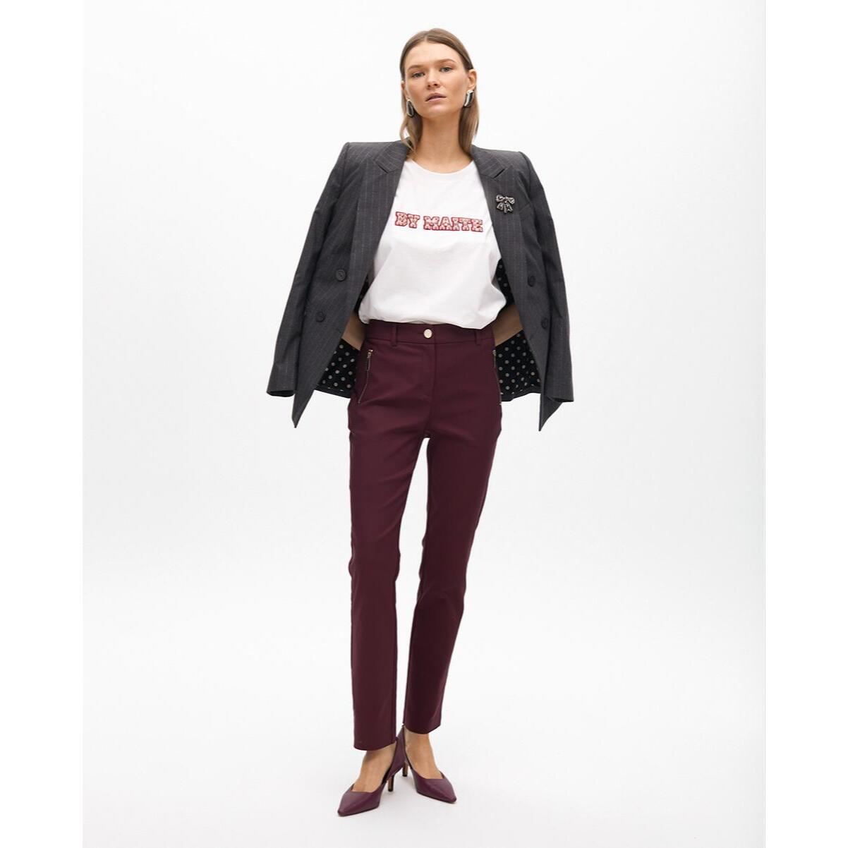 Pantaloni con tasche con zip in tessuto elastico