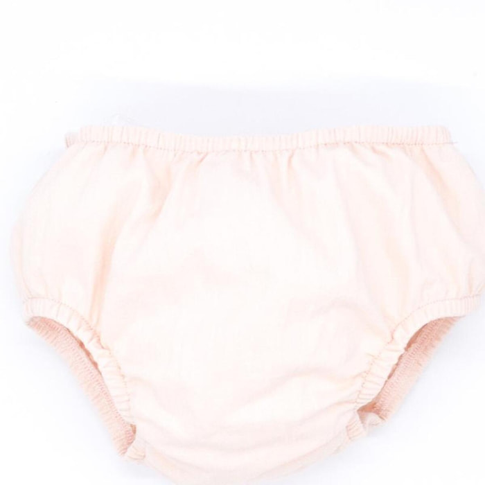 Cubrepañal de lino rosa. Elastico en la cintura y en las piernas.