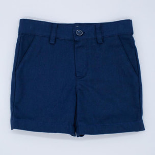 Bermuda de loneta azul marino, con bolsillos y bragueta.