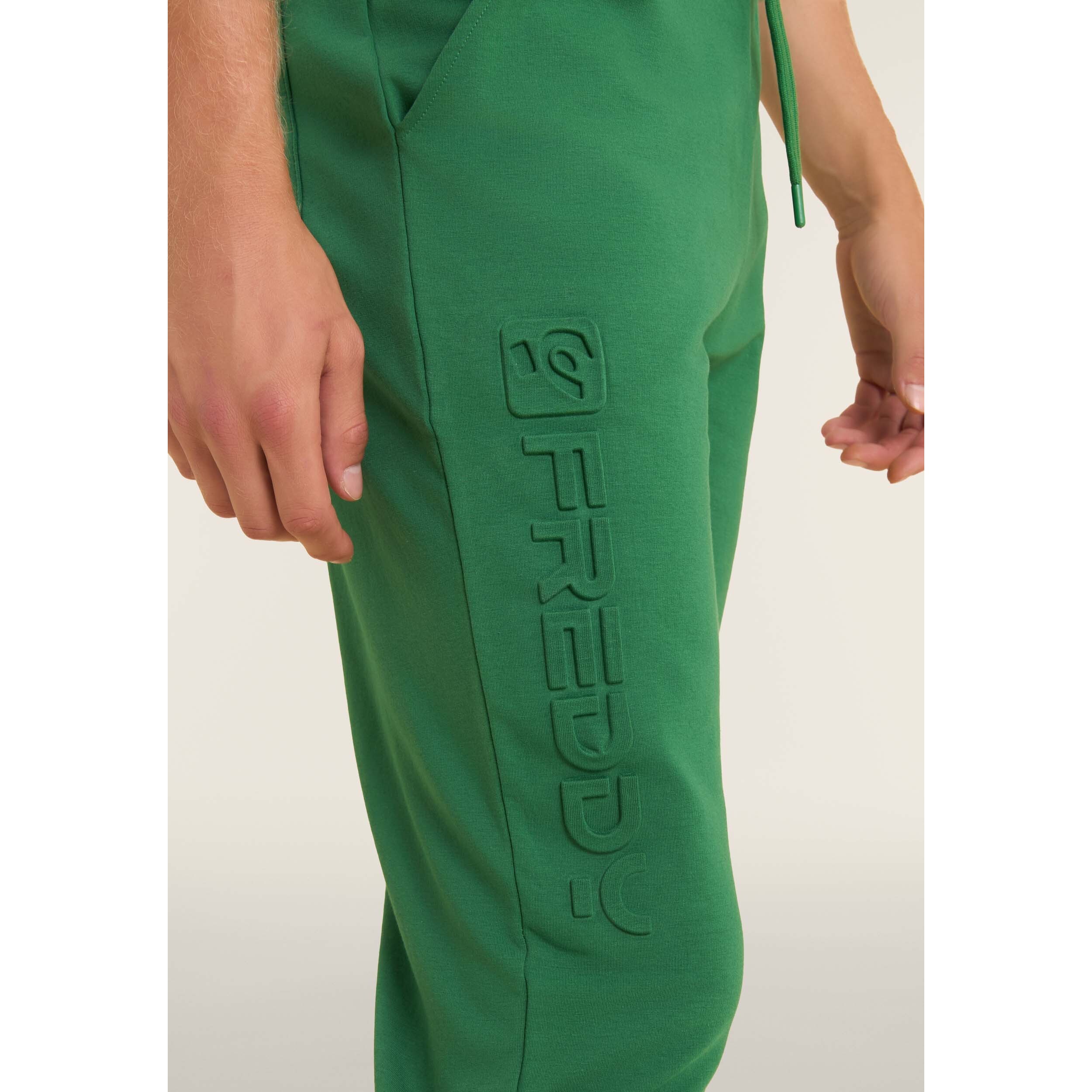 Pantaloni slim in interlock con maxi logo in rilievo