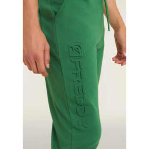 Pantaloni slim in interlock con maxi logo in rilievo