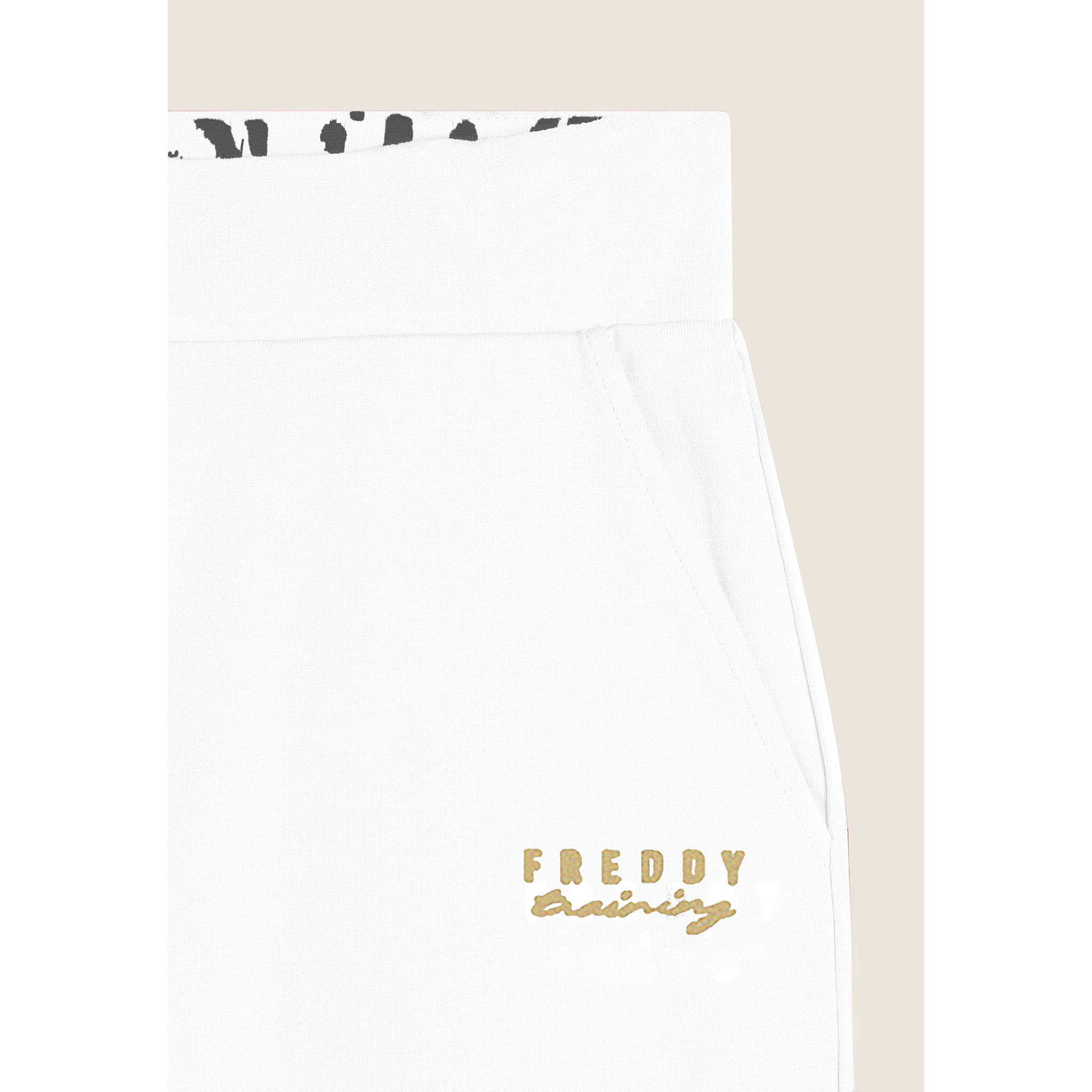 Pantaloni regular fit con fondo dritto con piccoli spacchi