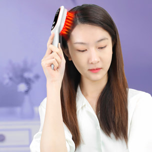 Pettine medico con trattamento di luminoterapia e massaggio a 9 intensità.