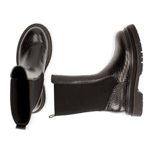 Botas Chelsea negras con estampado de víboras y tacón de 5 cm.