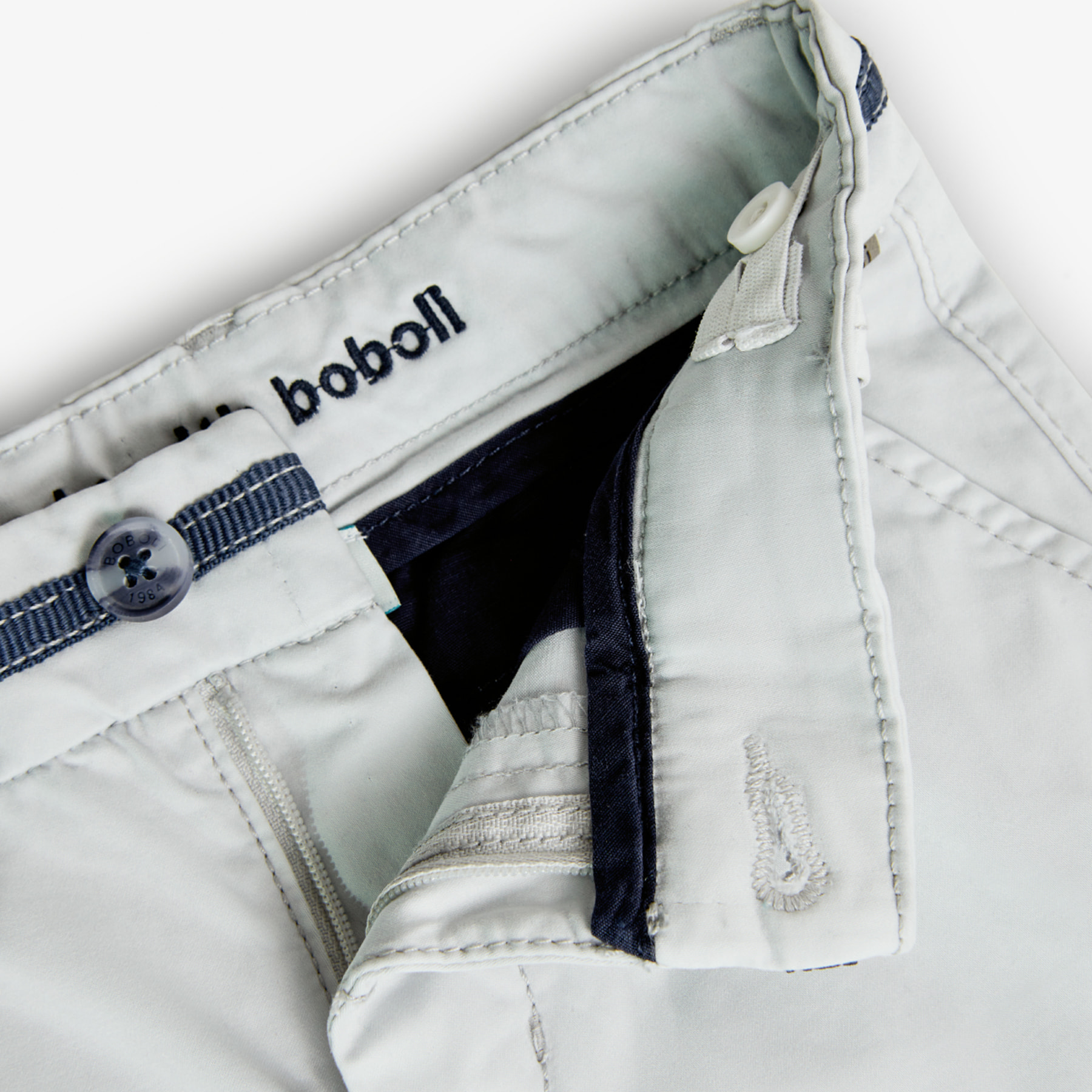 Pantalón elástico liso en botón de color beige