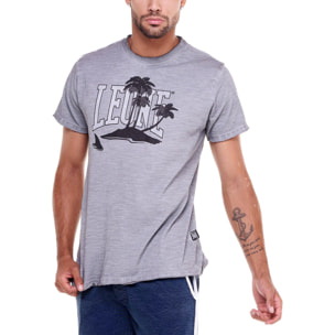 Camiseta hombre efecto desteñido palmera playa