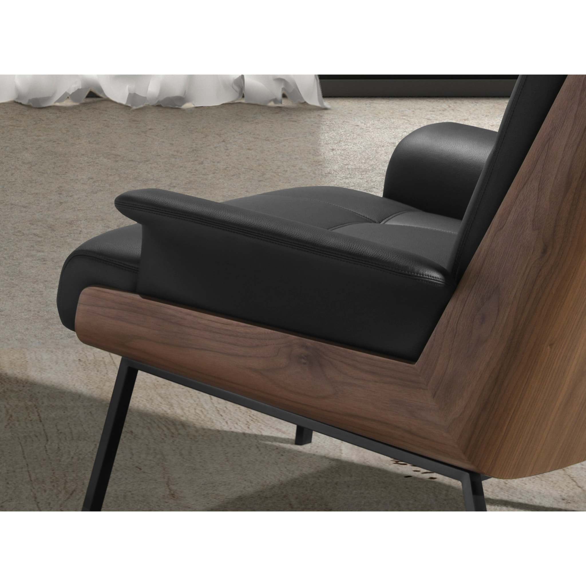 Sillón Angel Cerdá con reposabrazos con asiento y respaldo tapizados en polipiel negro detalle en madera chapada en nogal natural patas de acero inoxidable en negro 90x87x82cm
